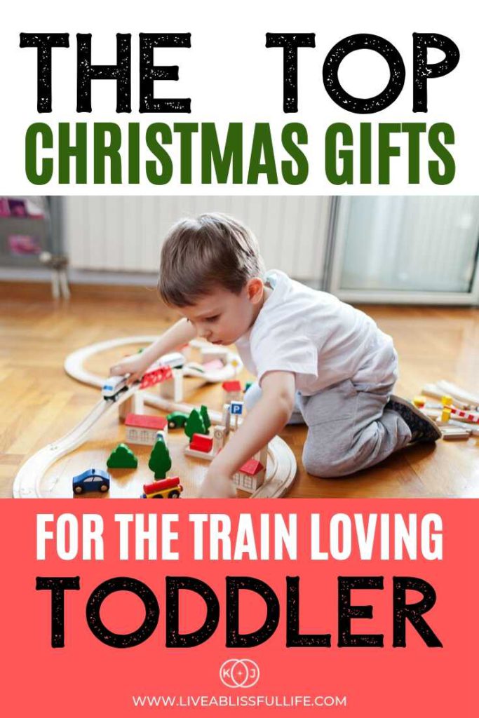 Image: Toddler playing with a train set
Text: The Top Christmas Gifts For The Train Loving Toddler