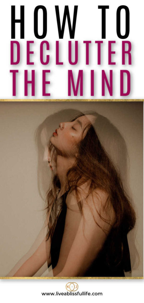 text: how to declutter the mind
image: woman in black shirt looking exhausted