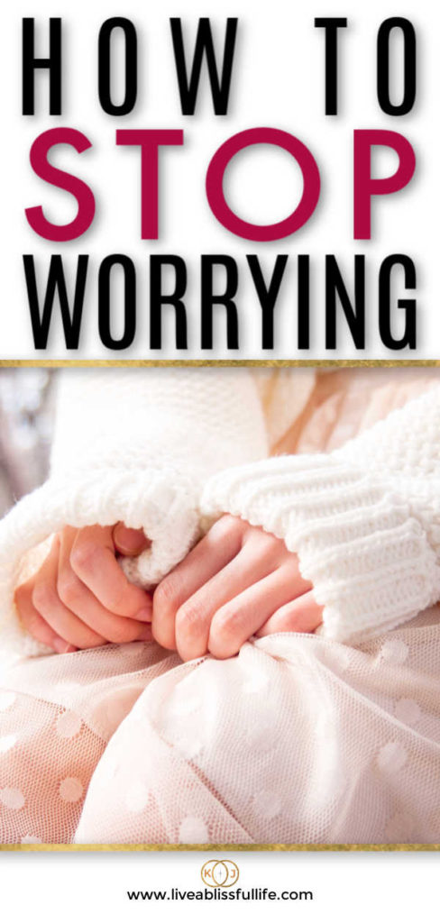 text: how to stop worrying
image: two hands clutching a white dress