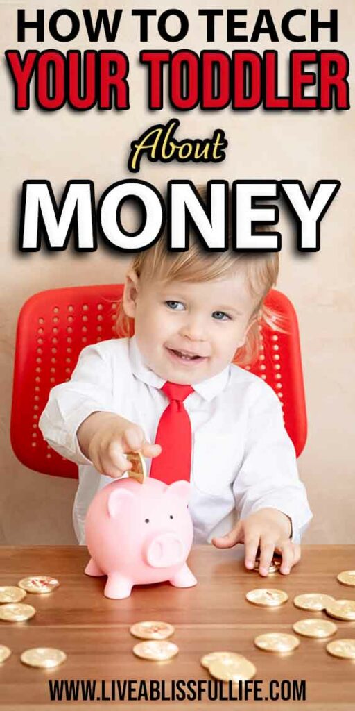 toddler putting gold coin in piggy bank